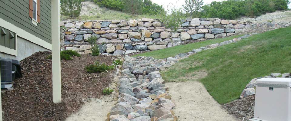 Multi-Family Drainage Improvements - Rip-Rap Wall