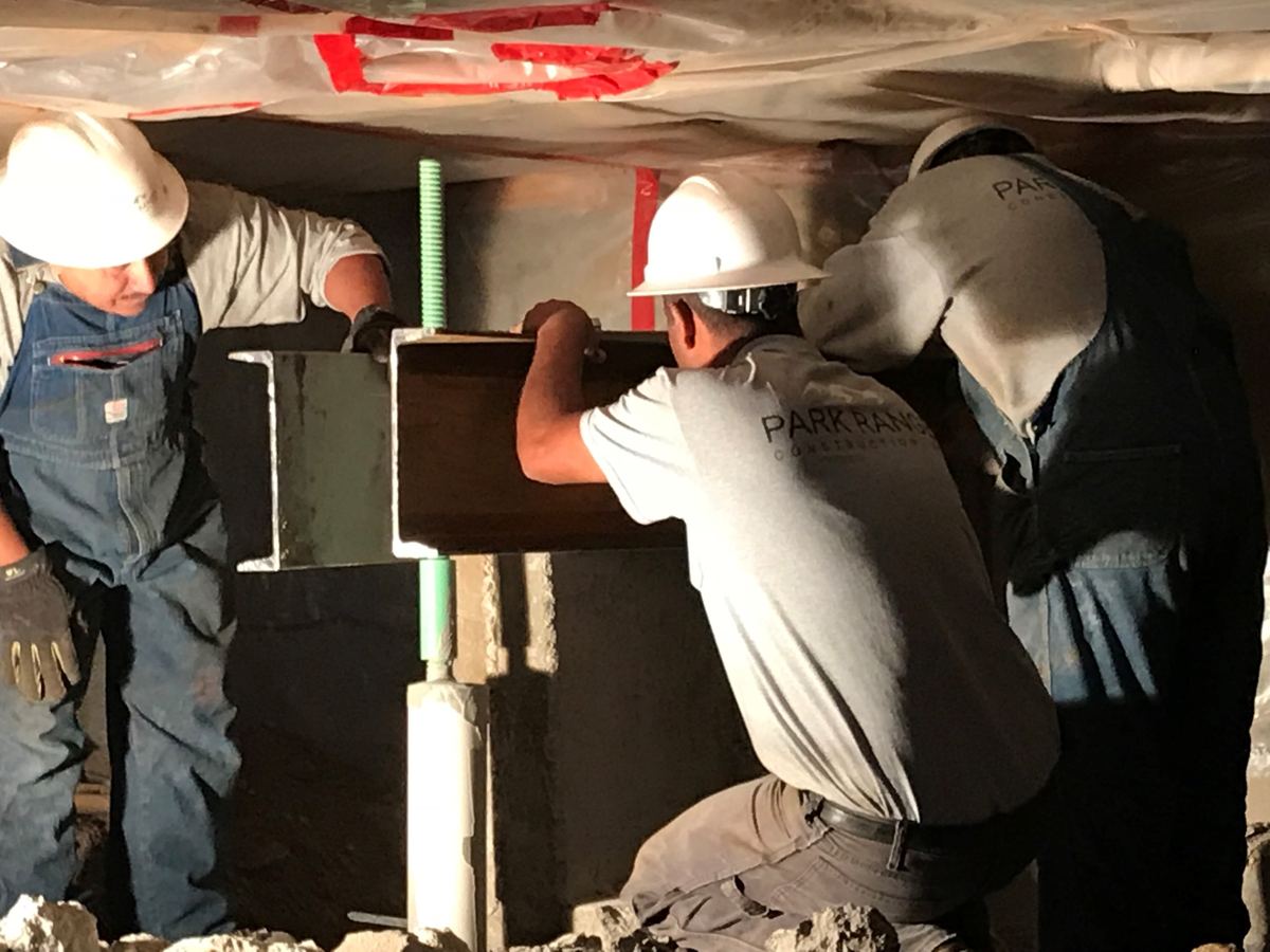 Park Range crew installing a structural repair inside a home